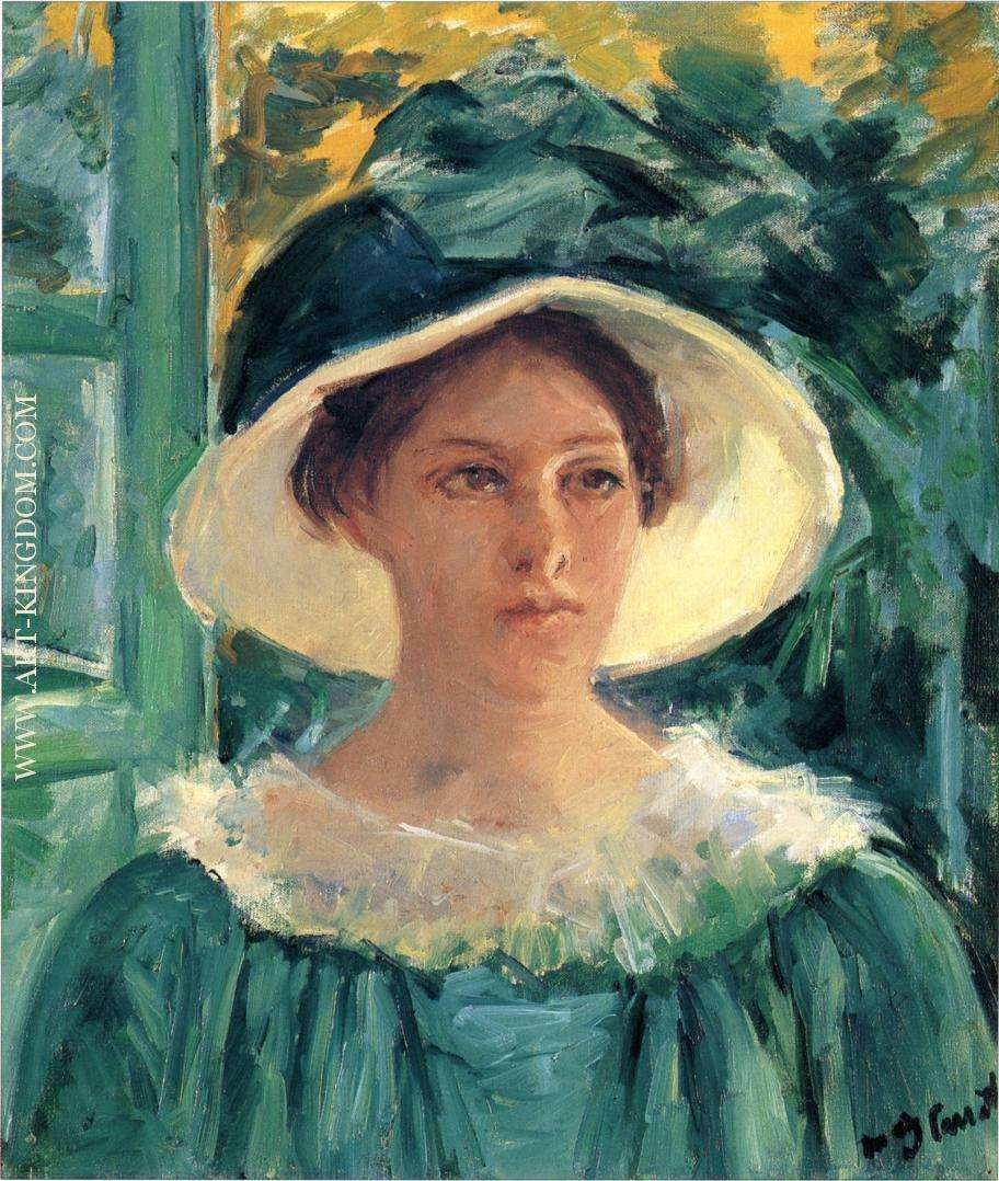 Young Woman in Green Outdoors in the Sun