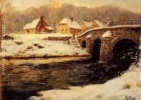 A Stone Bridge Over A Stream In Winter